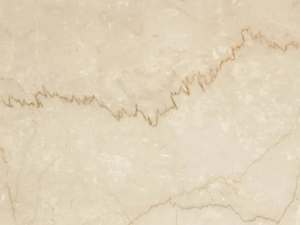 Botticino Classico detail: a jagged light brown vein over the beige