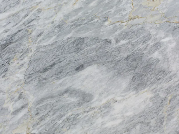 Calacatta Bluette marble detail up close: fine white and gray strokes over the bluish gray