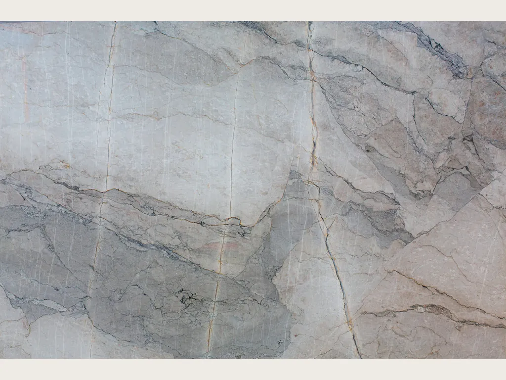 Slab of gray Camouflage marble: lavender-gray and blue-gray fragments with fine veins in a mosaic pattern