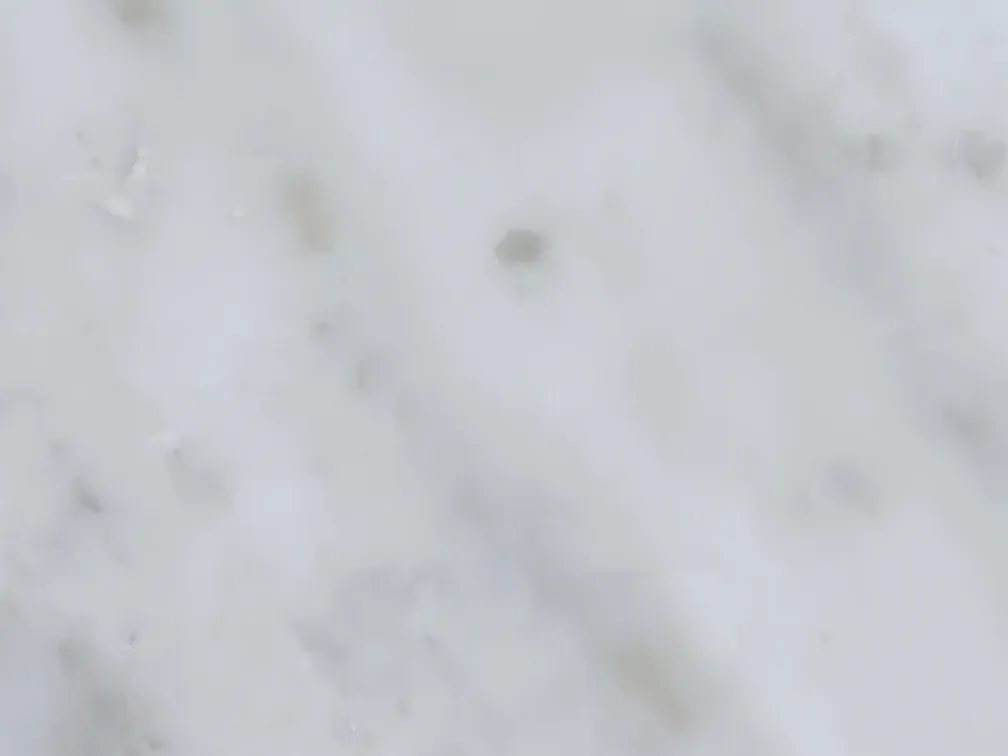 Close-up of a white Carrara CD marble slab