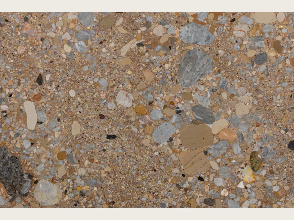 Slab of Ceppo Rosso marble: gray and beige pebbles on a matte reddish brown matrix