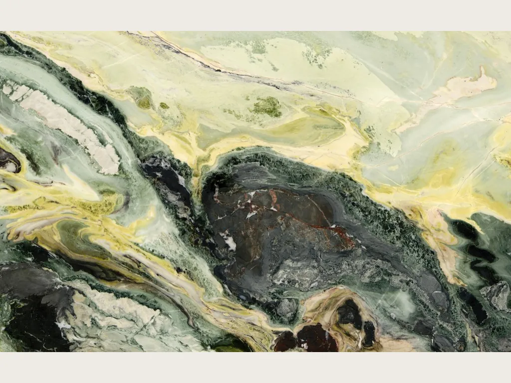Green Dream Green marble slab: pale lime green background with diagonal waves of dark green and yellow and a very dark central area.