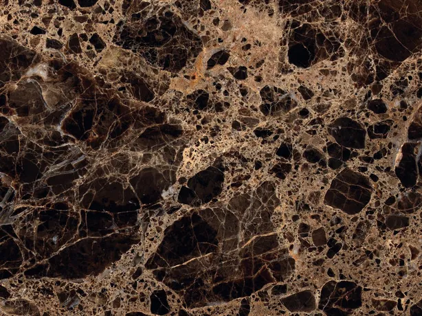Emperador Dark marble detail: a web of beige and light brown veins around dark patches