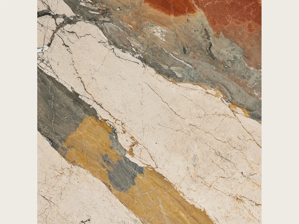 Slab of beige Etna marble: wide diagonal bands of greenish gray, ochre and rust red over cream