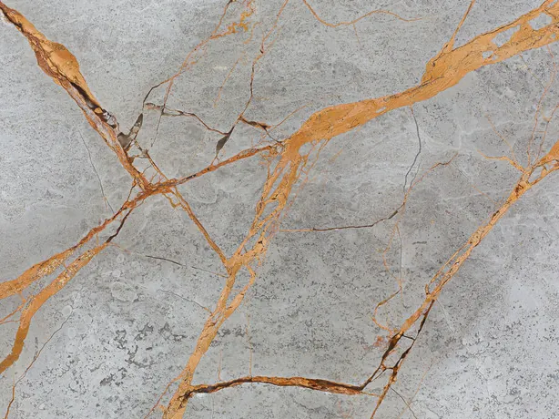 Close-up of Golden Sky Marble: golden orange vein and fine gray cracks