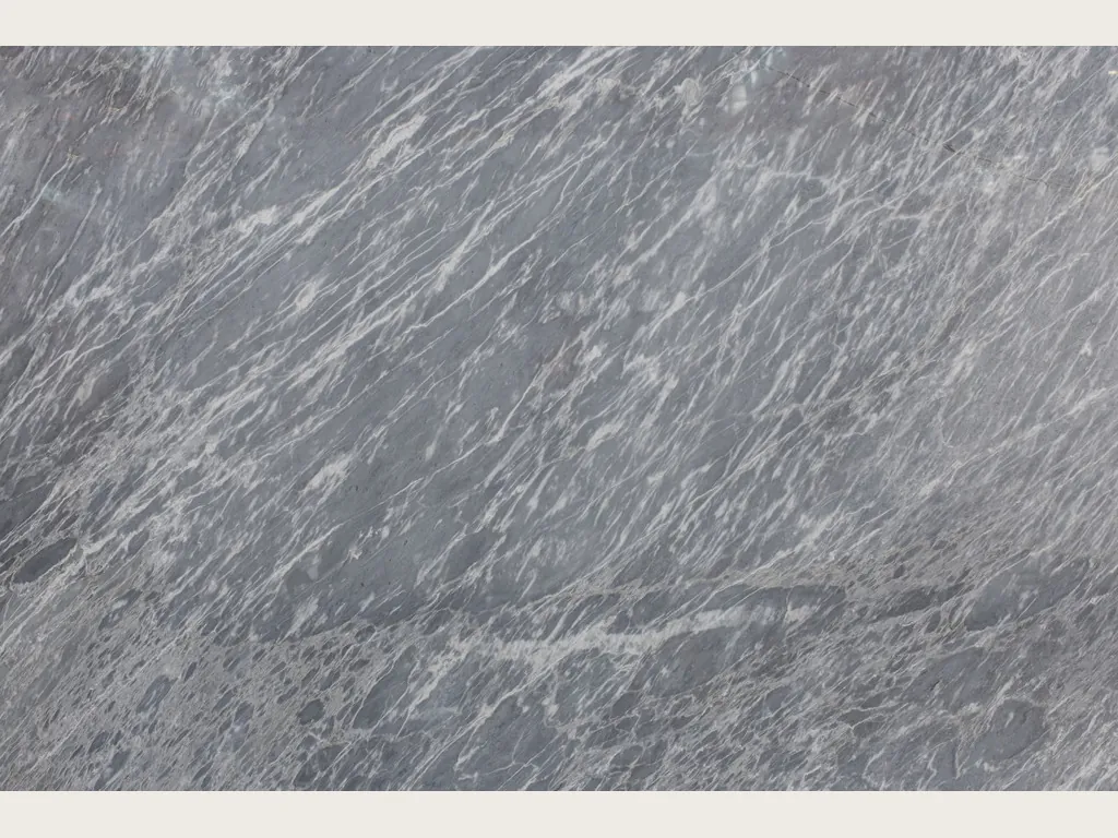 Grigio Perla marble slab: blue-gray background with fine, parallel white streaks running diagonally, polished finish