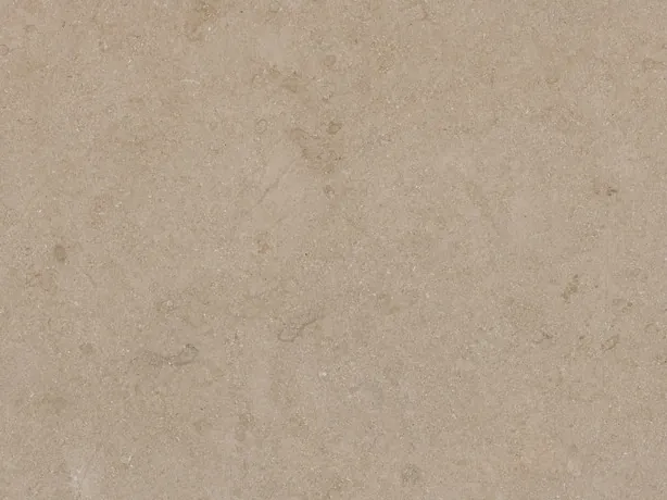 Close-up of Avorio marble: soft tonal clouds and touches of pink over the matte warm beige