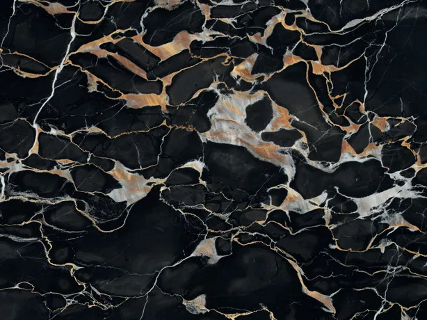 Detail of black Nero Portoro marble: fine to medium gold and white veins on the polished black