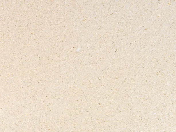 Detail of the New Marfil slab: tiny lighter specks on the cream background