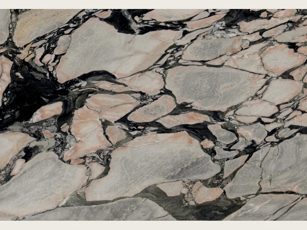 Slab of gray Notre Dame marble: gray and salmon pink fragments among thick black veins