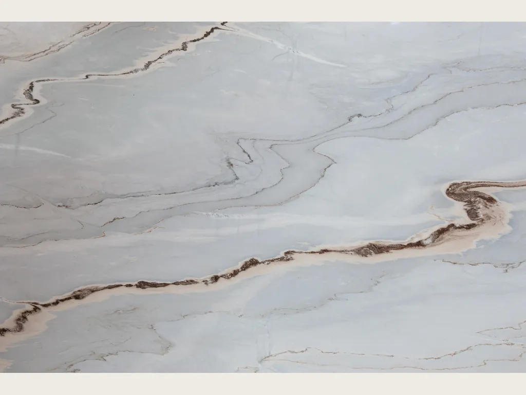 Palissandro Blu marble slab: blue-gray background with wavy lines and a rust band