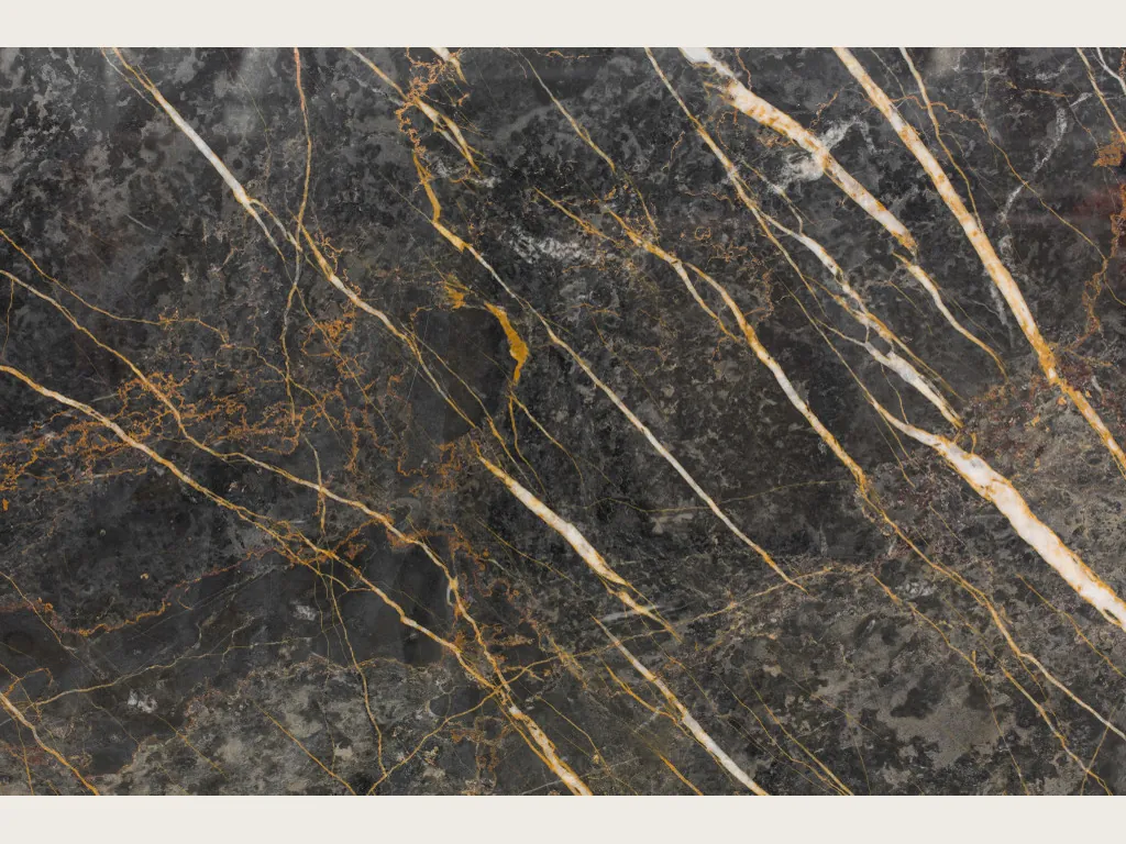 Black Port Laurent marble slab: charcoal gray with fine to medium gold and white veins, parallel and diagonal