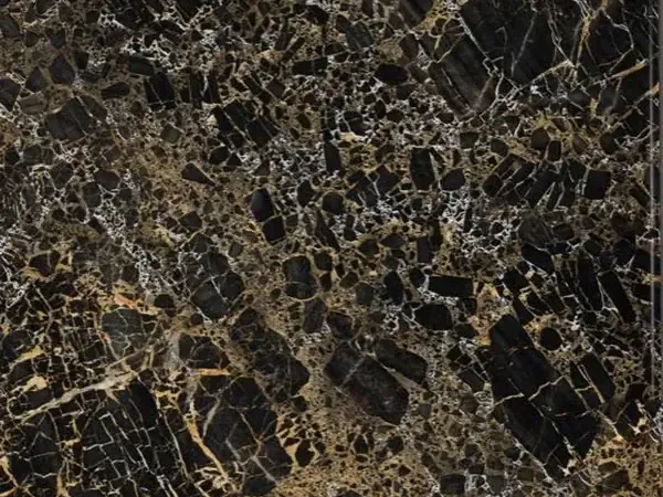Portoro marble slab: black fragments separated by a dense web of gold and white veins
