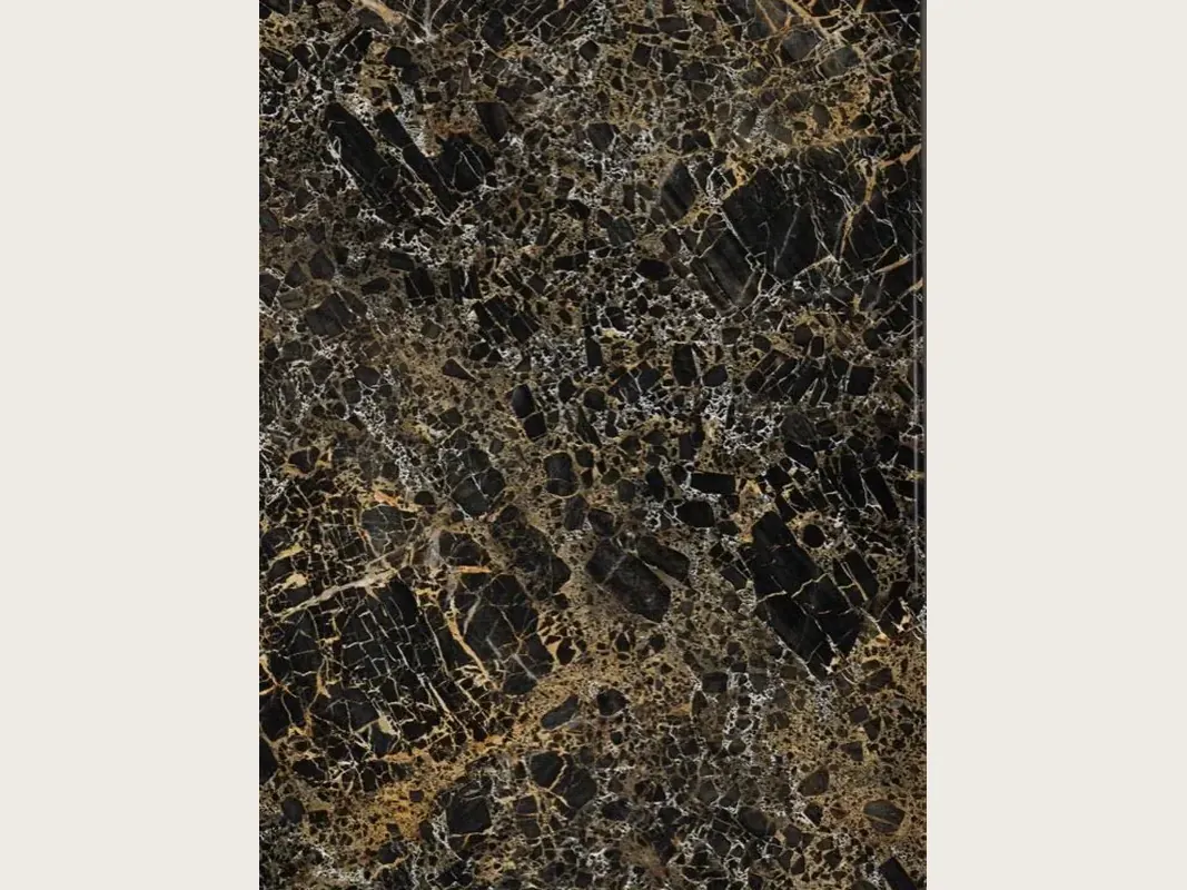 Black Portoro marble slab: black fragments separated by a dense web of gold and white veins