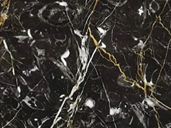 Prometeus marble slab: black background with crossed white and gold veins and some white swirls