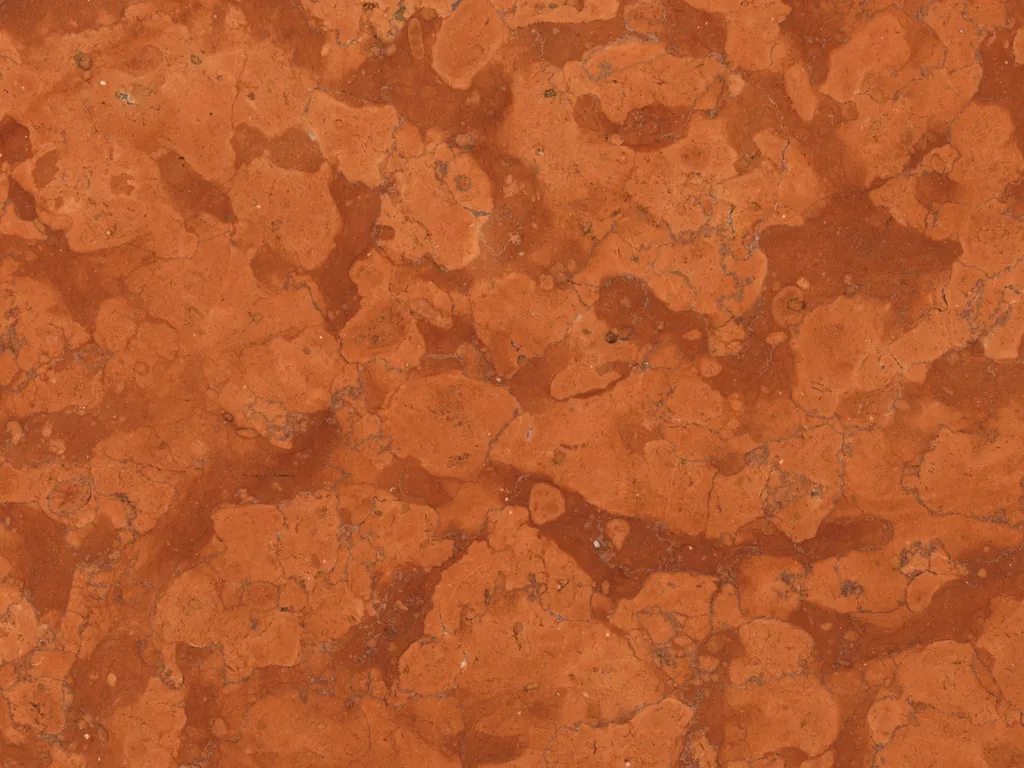 Rosso Asiago marble slab: a reddish orange background with light rounded patches and no veins