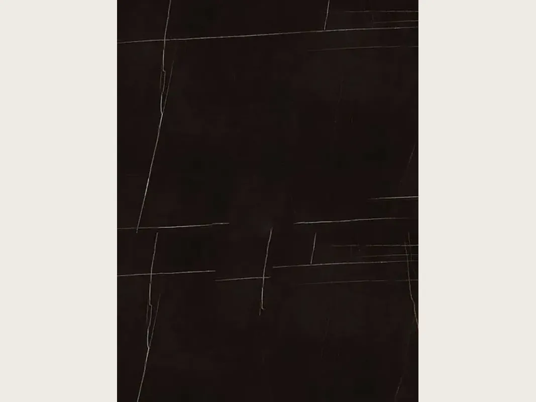 Slab of Sahara Noir black marble: brown-black background with very fine gold lines