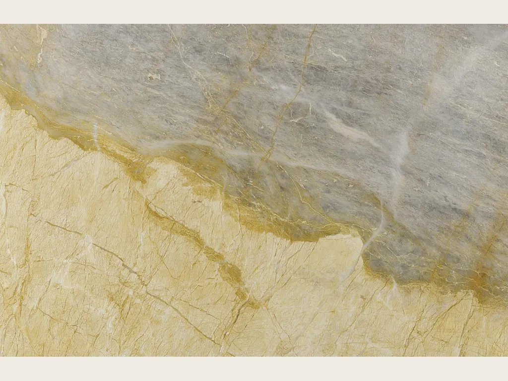 Slab of beige Skysand marble: a golden yellow area and a blue-gray area separated by a diagonal ochre line