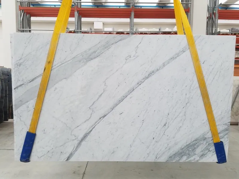 Statuarietto Marble slab: white background with medium bluish gray diagonal veins and fine branching