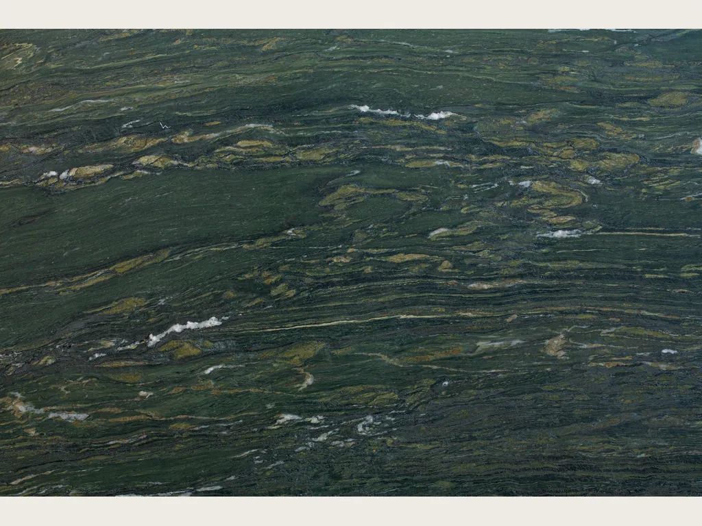 Verde Pavone marble slab: dark green background with elongated golden and white strokes running horizontally