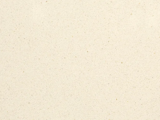 Close-up of beige Veselje marble: barely visible dark specks on the matte cream