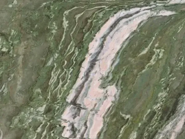 Slab of Brioches Onyx: grayish green with a wide pink and white band crossing it diagonally
