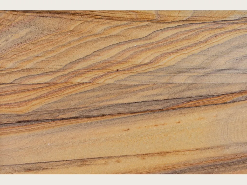 Rainbow onyx slab: gray-green background with orange, yellow and cream veins branching vertically (another slab)