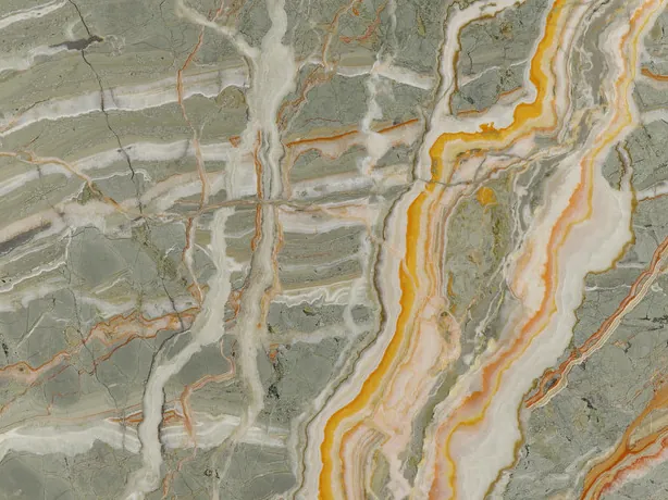 Detail of the Rainbow onyx slab: branching orange veins and the shine of the polish