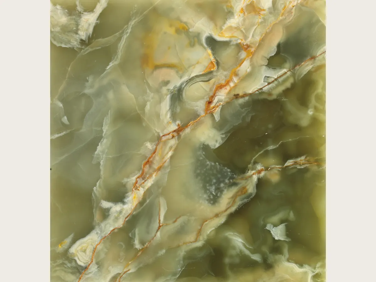Green onyx slab: pale green background with beige and brown diagonal veins (another slab)