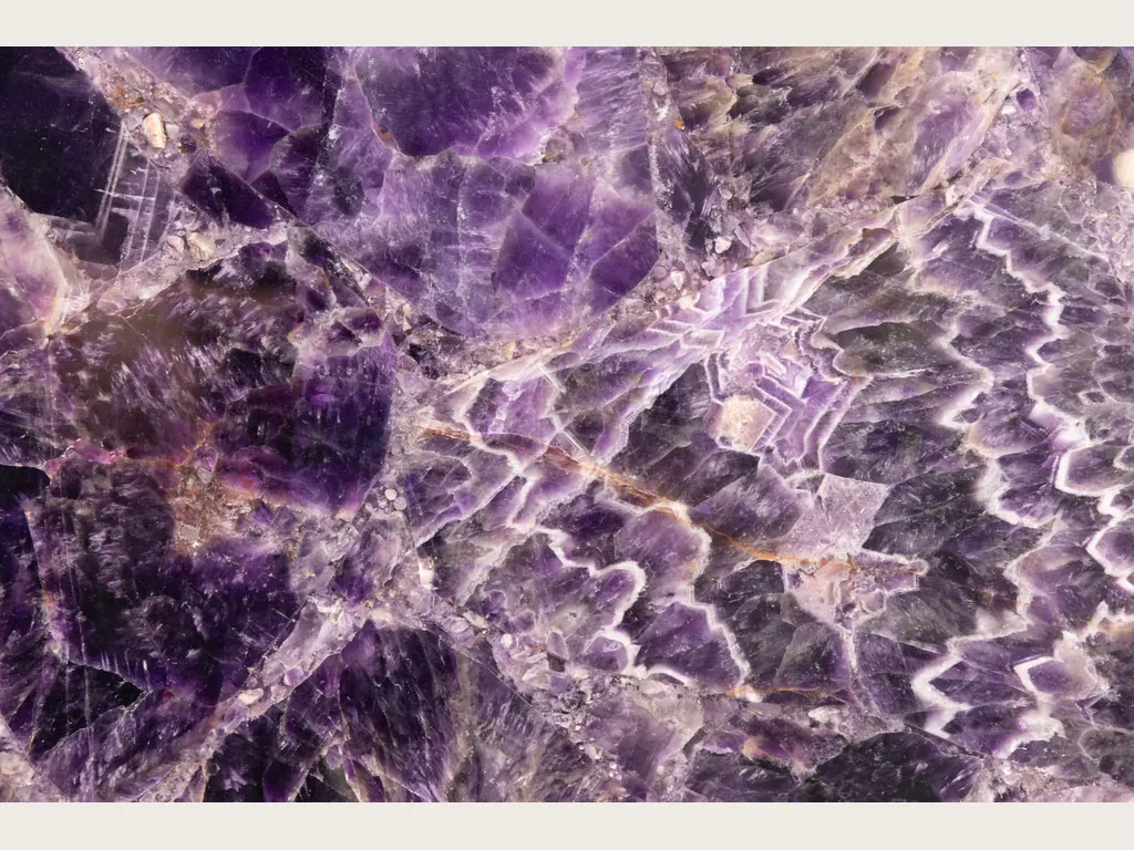 Amethyst slab: dark violet crystals with white and lilac zigzag bands