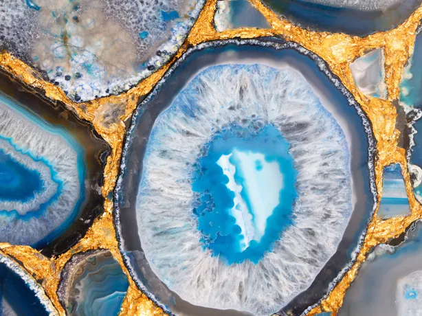 Detail of blue agate with gold leaf: thick gold joints between blue and white slices