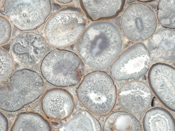 Crystal agate detail: the gray edges and crystalline white centers of each slice