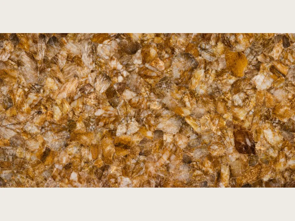 Slab of lemon quartz: tightly packed honey and cream glassy fragments with a polished sheen