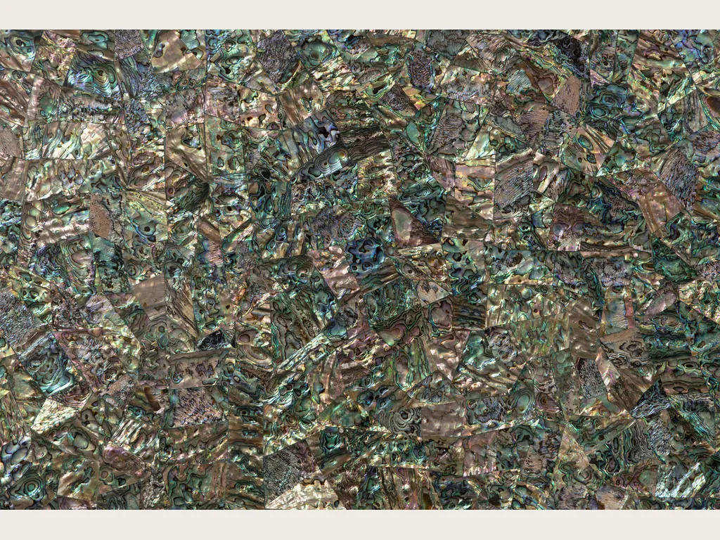Abalone mother of pearl slab: a dense mosaic of iridescent shell in greens, blues and browns