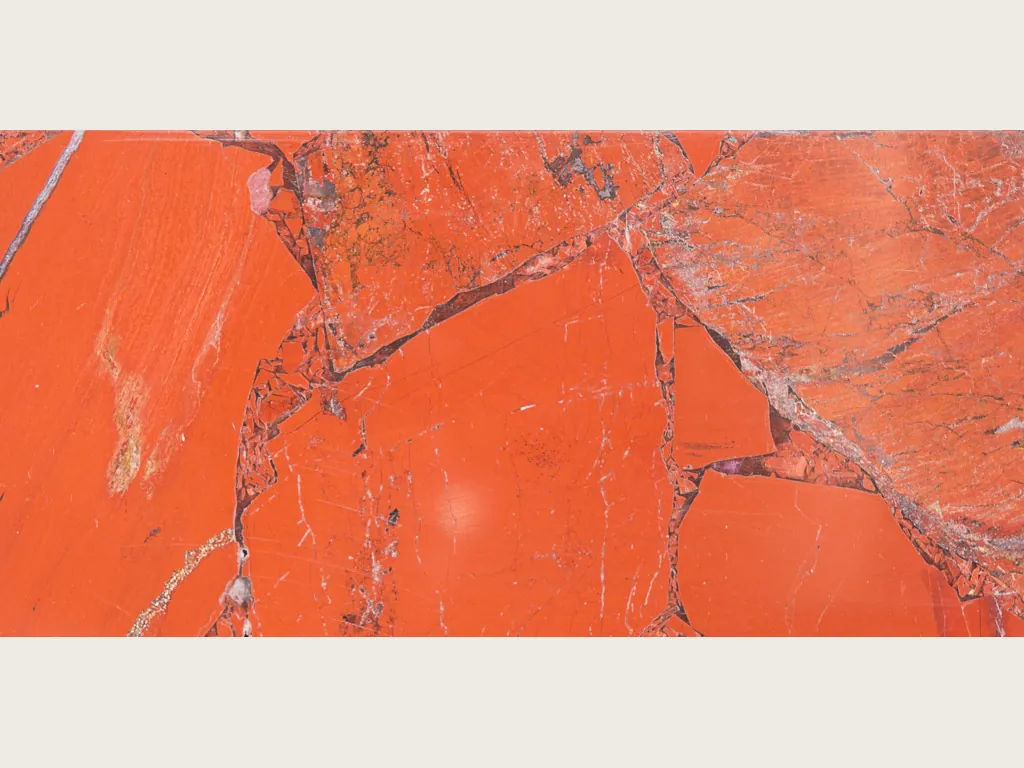 Red Jasper slab: large orange-red pieces joined by fine gray lines