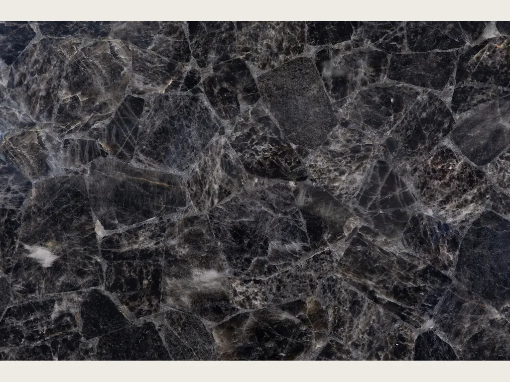 Smoky quartz slab: angular dark gray fragments with light edges and white lines
