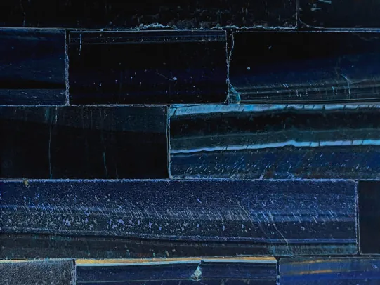Detail of blue tiger's eye: fine blue flashes and the sheen of the polish