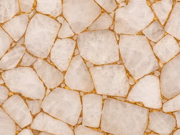 Close-up of White Quartz with Gold Leaf: the web of gold joints between quartz polygons