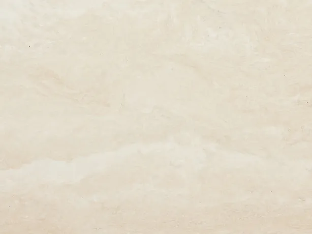 White travertine detail: cloudy pattern and soft horizontal waves over the creamy ivory