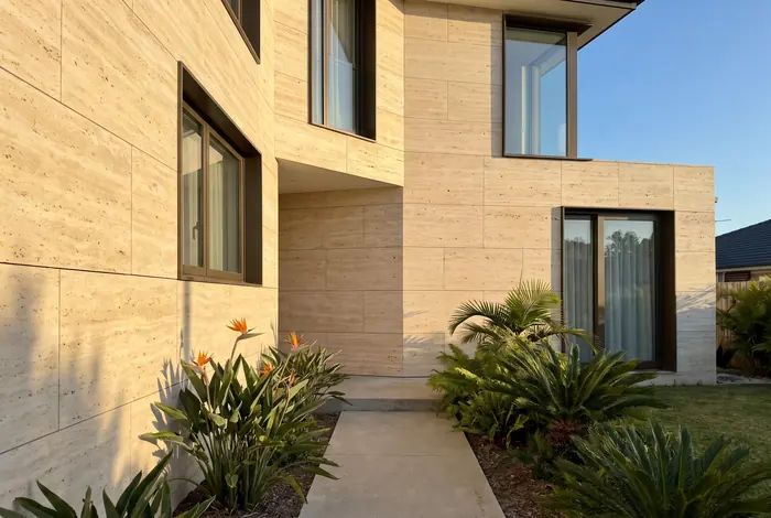 House facade clad in travertine
